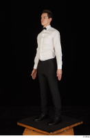 Jamie black shoes black trousers bow tie dressed standing uniform waiter uniform white shirt whole body 0002.jpg